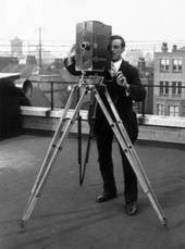 One of the Lumière brothers making the film 
